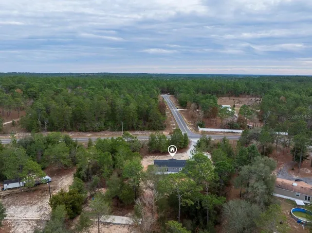 2+ACRES ON WHIRLWIND LAKE / PAVED ROAD