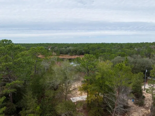 2+ACRES ON WHIRLWIND LAKE / PAVED ROAD