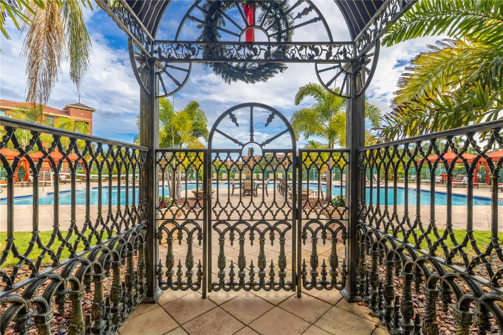 Beautifully designed gated entrance to the clubhouse pool and cabana area.