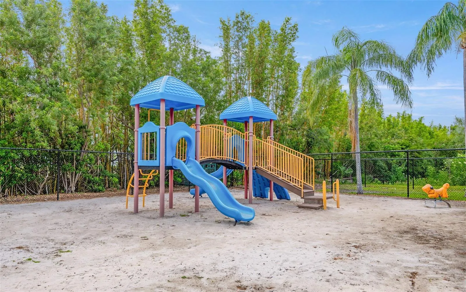 Enclosed playground area providing extra security for your little ones.