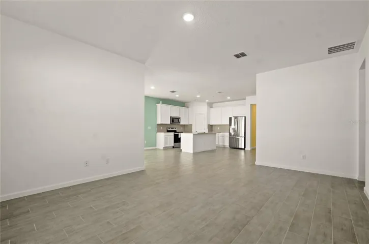 Living room looking to kitchen.