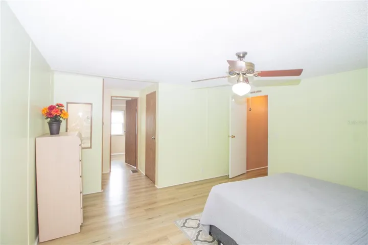 Master bedroom facing walk-in closet and on-suite bath