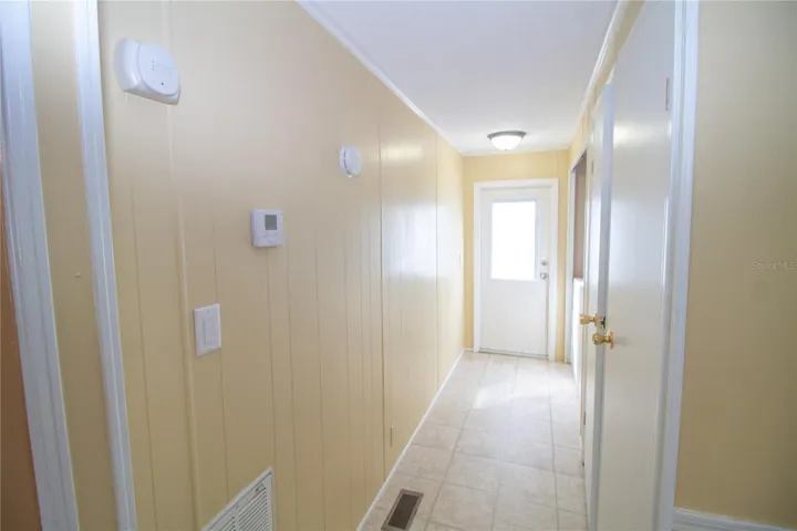 Laundry and closets off of kitchen