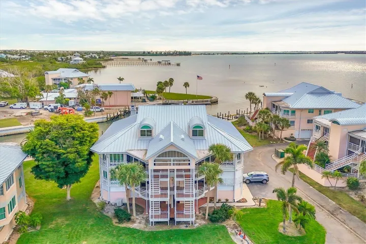 Enjoy expansive views of the Intracoastal & marina from your private residence