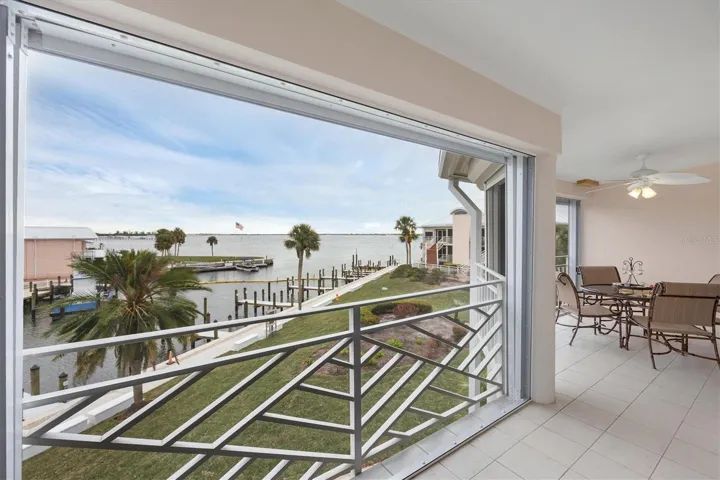 Watch the boats cruise along and capture views of the Boca Grande Causeway in the distance