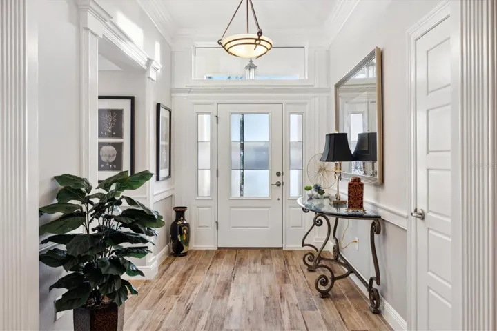 GLASS SIDE LITES*SPECTACULAR TRIM THROUGHOUT THE HOME!