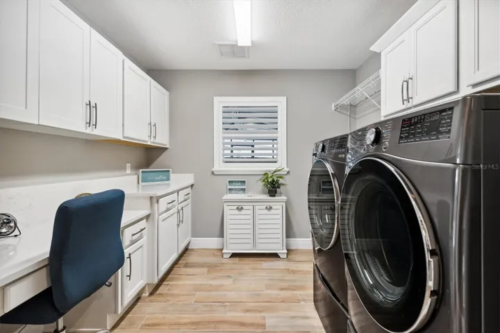 LAUNDRY ROOM W/CABINETS*QUARTZ COUNTERS & SINK