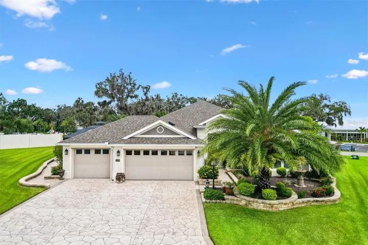 3 CAR GARAGE WITH REMOTE SCREENS + STAMPED DRIVEWAY & WALKWAY
