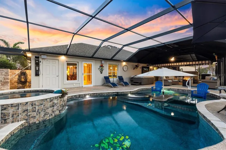 DOOR ON THE LEFT IS THE POOL CLOSET*OUTDOOR SHOWER TO THE LEFT & GRILL AREA TO THE LEFT OF THE SHOWER