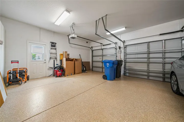 3 car garage with exterior access door
