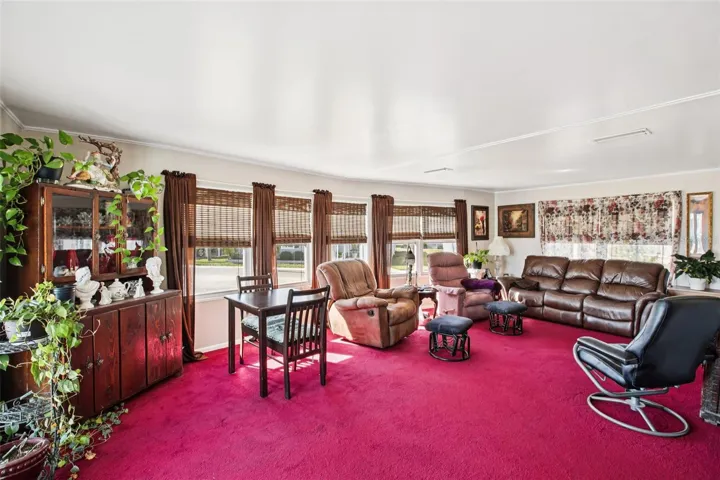 Living room showing window treatments.