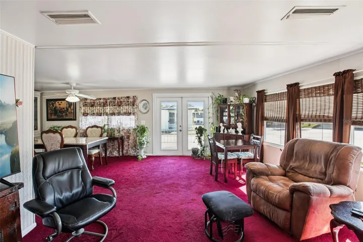 Living room facing front French door.