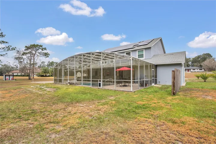 Expansive 2.5-acre lot with screened-pool retreat