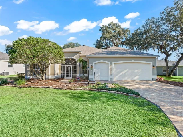 Welcome to this beautifully maintained home with impressive curb appeal, featuring a sealed paver driveway (12/2025), manicured landscaping, and mature trees offering shade and privacy.