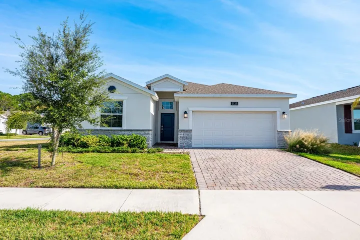 Tucked inside the GUARD-GATED Camden Park at Providence, this stunning, NEARLY NEW 4-bedroom, 3-bath residence offers over 2,000 SQUARE FEET of refined living in one of the area’s most sought-after golf communities.