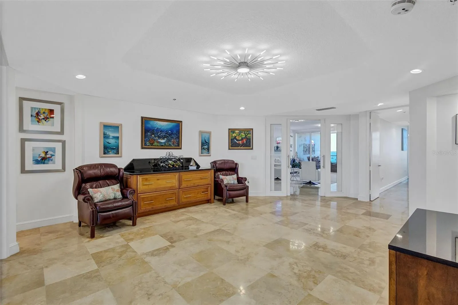 Bright and Cheerful - TV/Den Area - Travertine stone Floors and sharp modern lighting