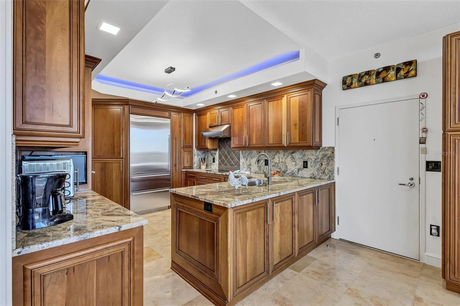 Service entrance, conveniently located adjacent to kitchen