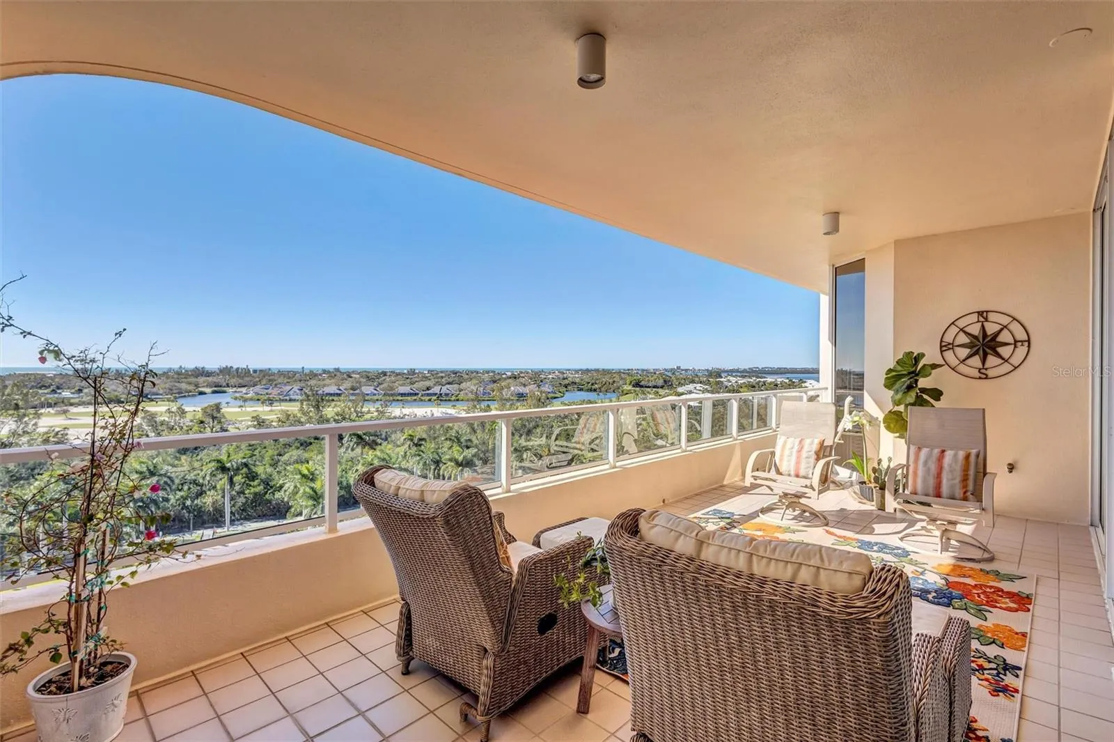 Terrace  View Westerly viewing of Grand Bay Community, Longboat Key Golf Course, and Gulf of Mexico.  Both large and comfortable here