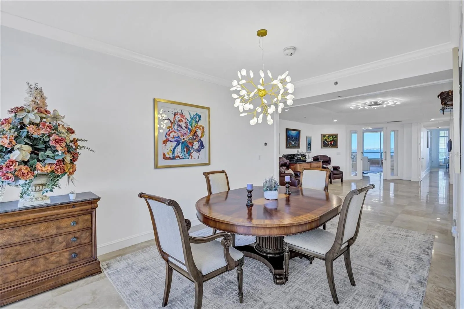 Dining Room with Golf Course Views, Longboat Key Club Views and  Gulf Views.  Floor to ceiling windows throughout. Eat dinner with views of the Gulf of Mexico and Sarasota Bay both at the same time.