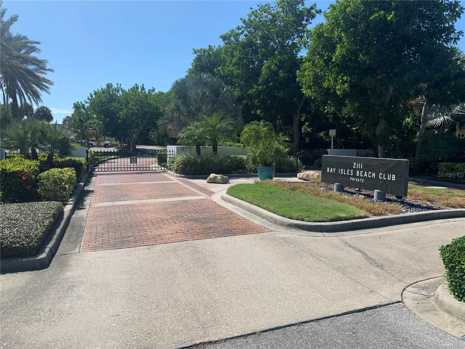 Private gated  entrance to Bay Isles Beach Club. Newly renovated showers, bathrooms, and facilities are among many benefits