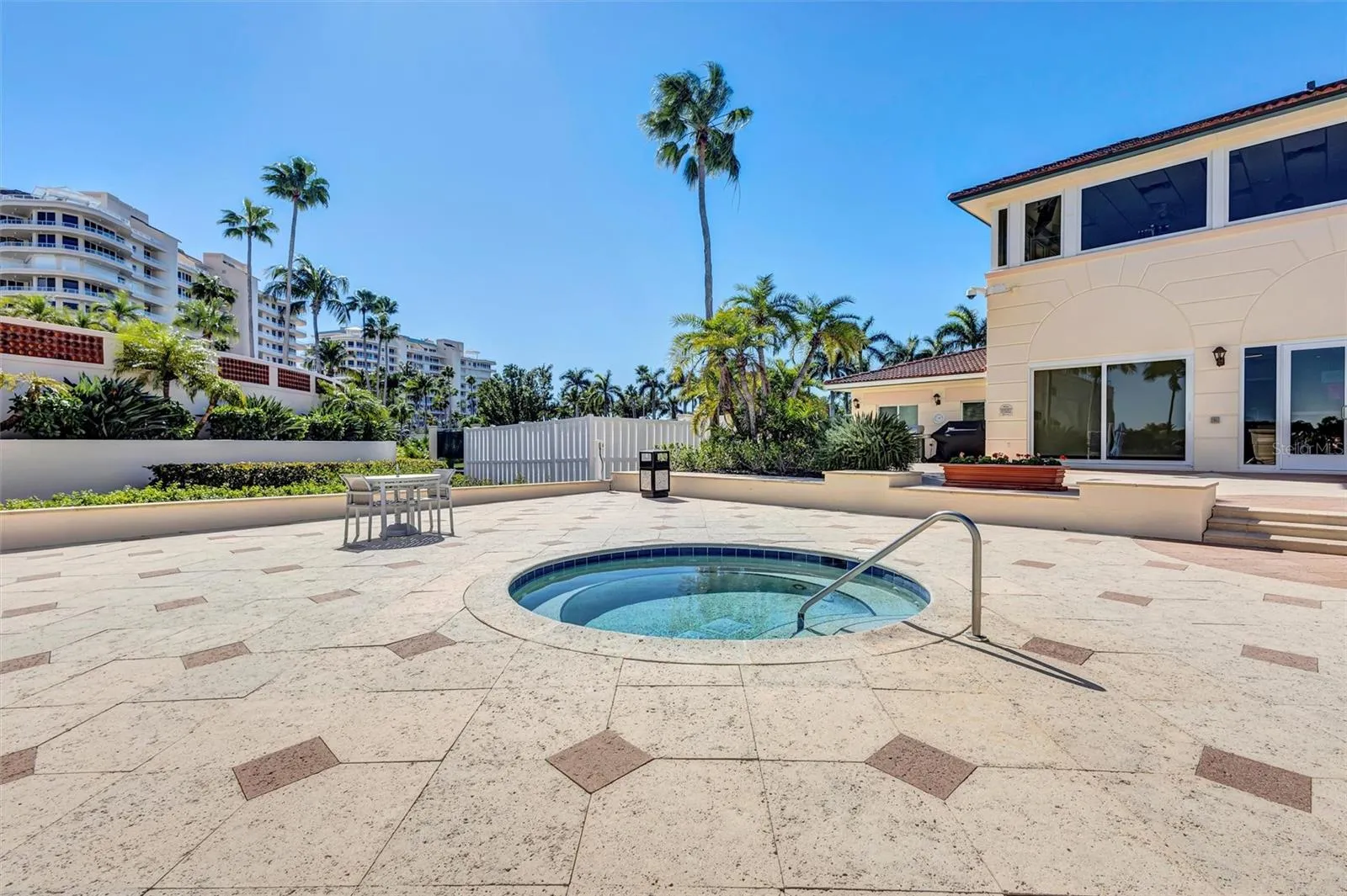 Grand Bay Swimming Pool  heated spa area and Barbecue. New Patio Furniture, Lounge Chairs, Sofa's, Umbrellas and Barbecue Area