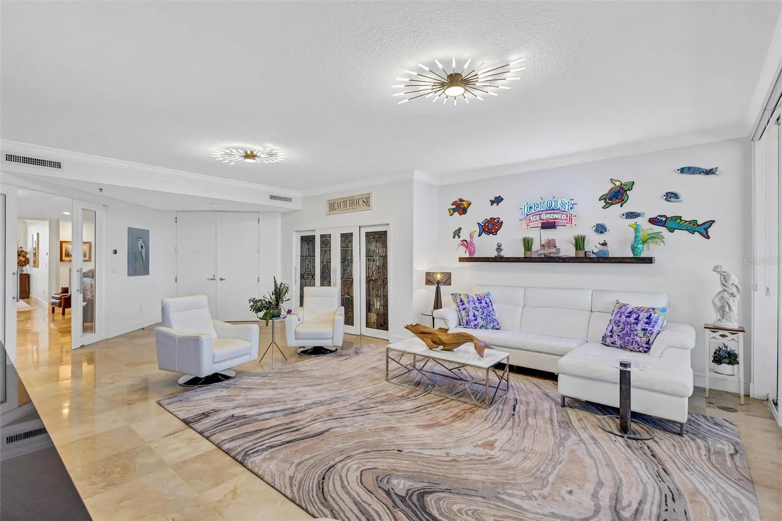Polished  travertine Stone flooring throughout the attire home