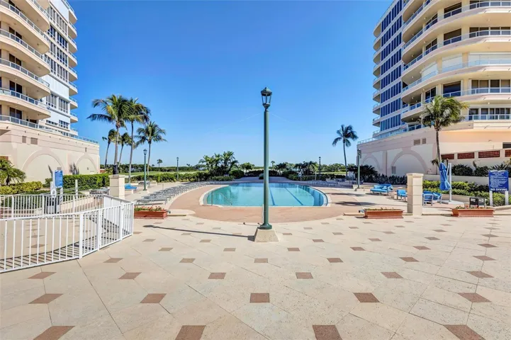 Grand Bay Swimming Pool Area and Barbecue. New Patio Furniture, Lounge Chairs, Sofa's, Umbrellas and Barbecue Area