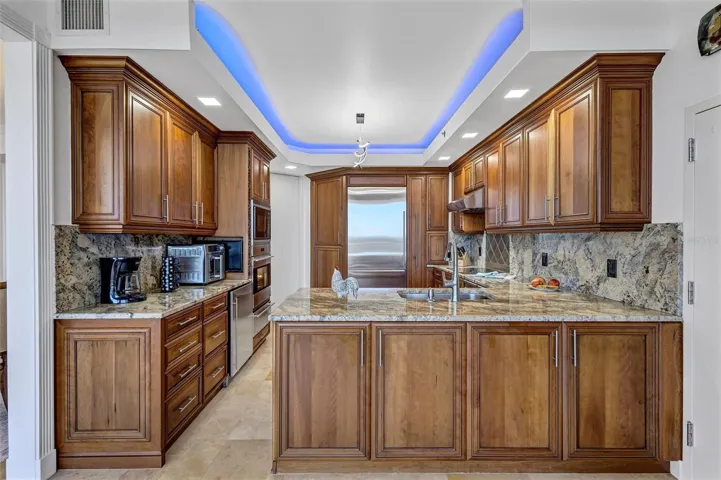 Matching earth tones, and stainless steel reflect clean symmetry and style