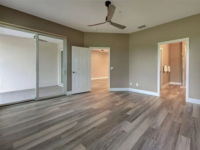 Sliding Door out to Extended Screened Lanai