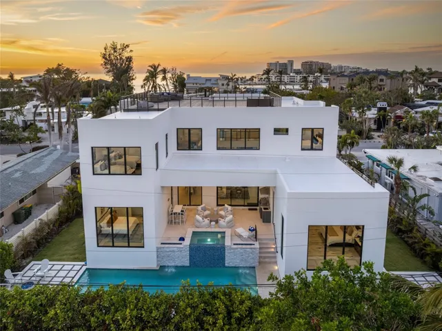 Rear elevation with Gulf backdrop—prime Lido Shores location