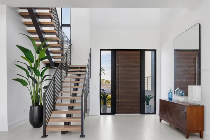 Floating staircase with Italian oak treads—architectural focal point