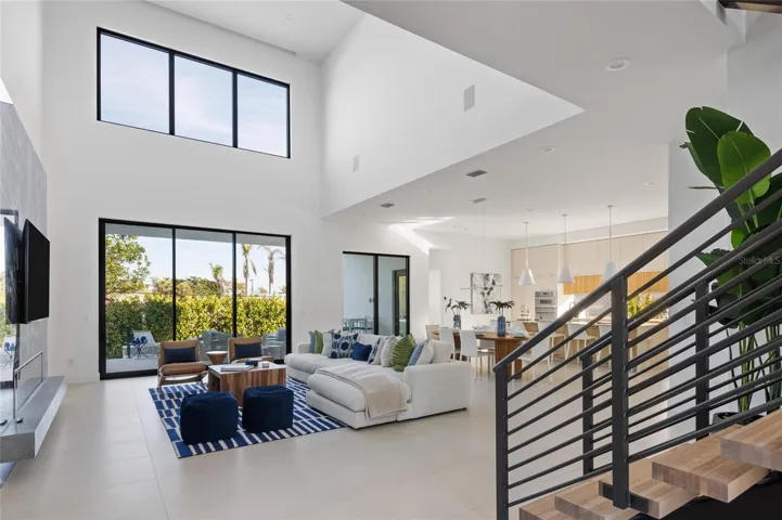 Grand entry with double-height living room &amp; impact insulated windows