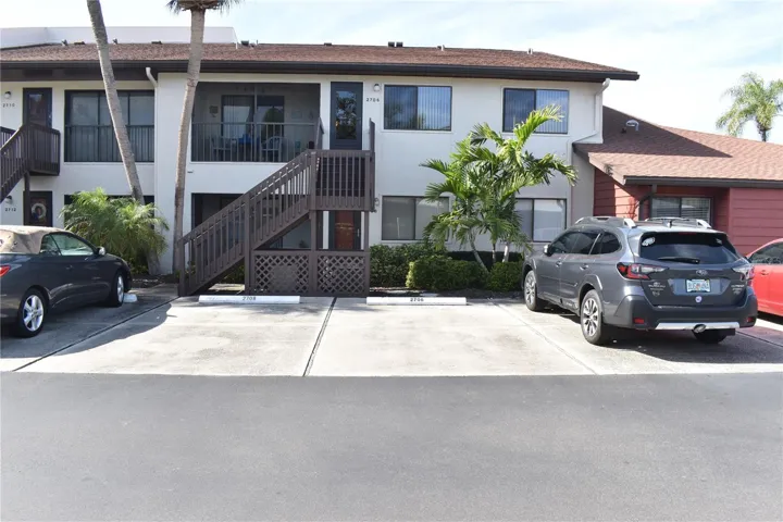 Front of condo with your parking space