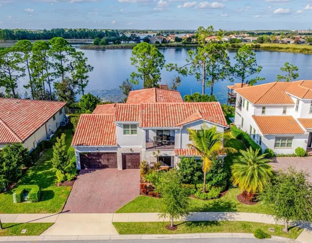 Perfectly positioned on Hickorynut Lake within the exclusive Avalon Cove, this custom Jones Homes residence was built in 2022 and is one of only 49 homes in this intimate luxury enclave!