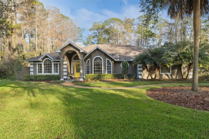 Set on 1.01 ACRES beneath a canopy of mature oaks, this single-story 4-bedroom, 3-bath POOL HOME delivers the rare combination of space, privacy, and location in the sought-after Live Oak Estates community of Orlando/Lake Nona!