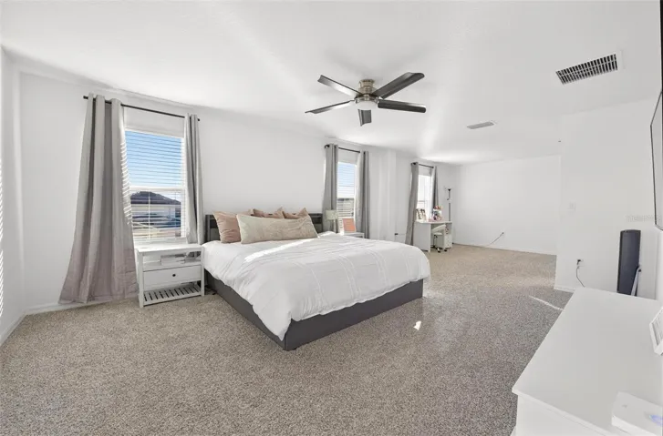 Spacious Primary Suite with attached sitting area.