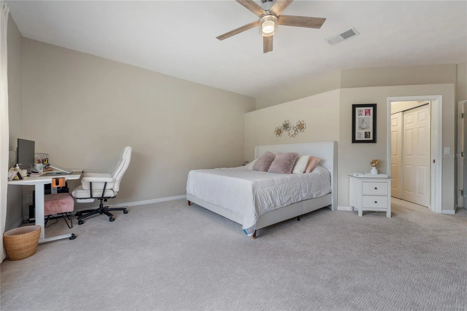 Oversized primary bedroom offering comfort, privacy, and generous square footage.