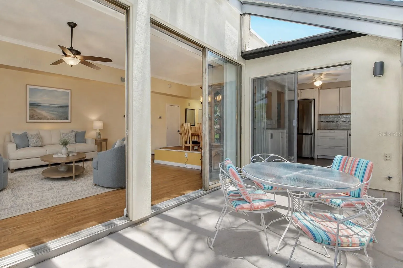 Screen patio that flows seamlessly from living room