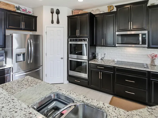 Elegant kitchen with professional-grade appliances and sleek cabinetry.