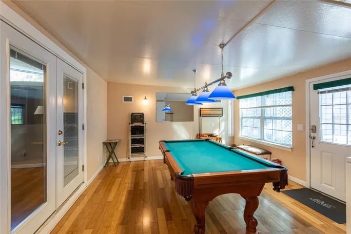 This room is part of the solid built add on and leads to the backyard.  Can be converted to a bedroom.