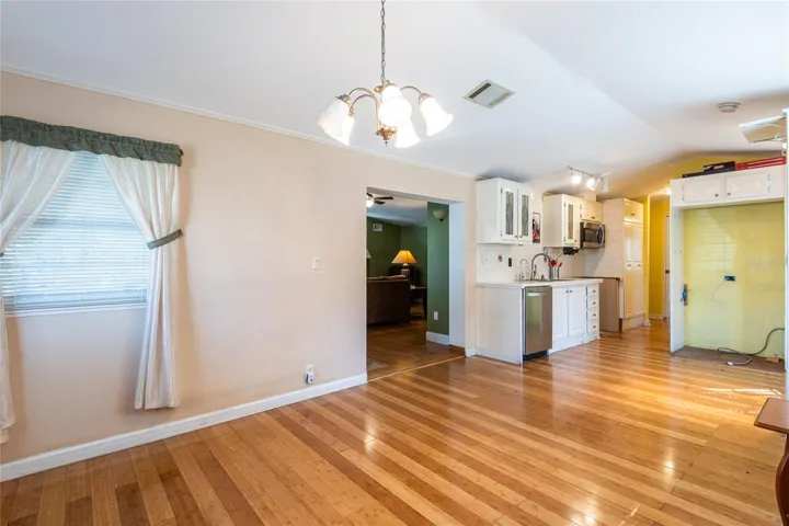 Dining room and kitchen leads to the beautiful living/great rooms