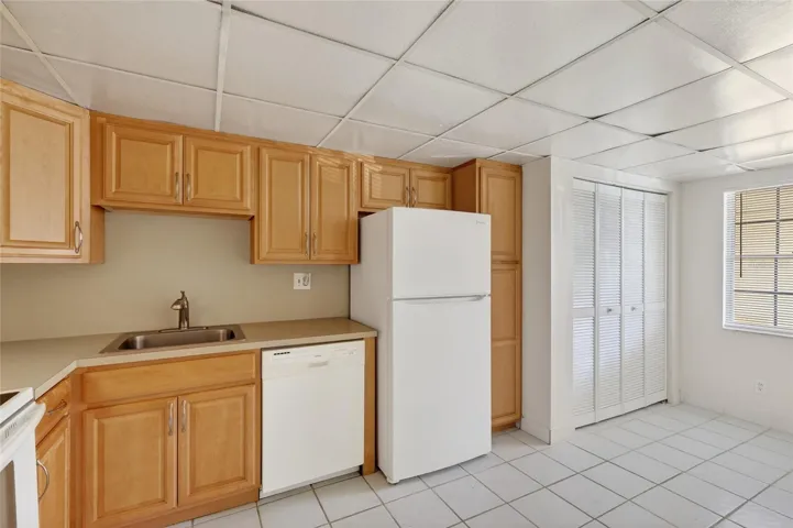 KITCHEN AND LANDRY ROOM CLOSET