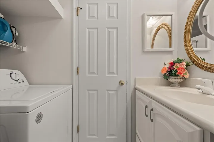 Laundry area with washer
