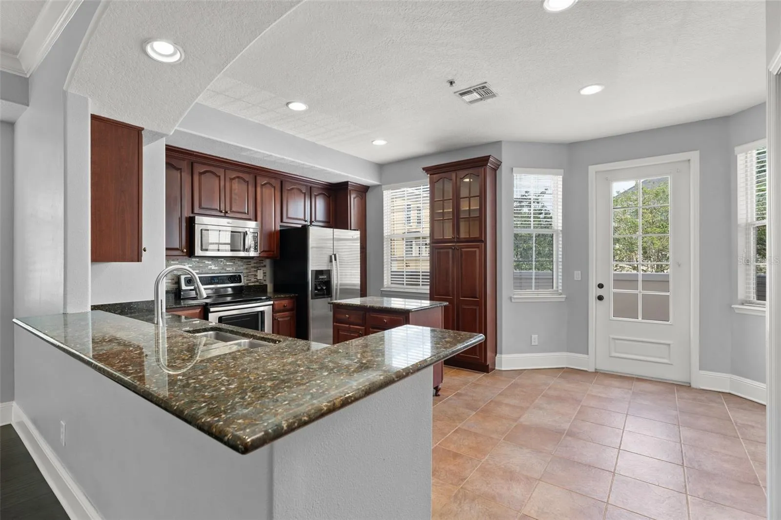 Large kitchen with balcony access!