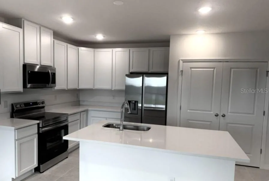 Spacious kitchen with stainless steel appliances
