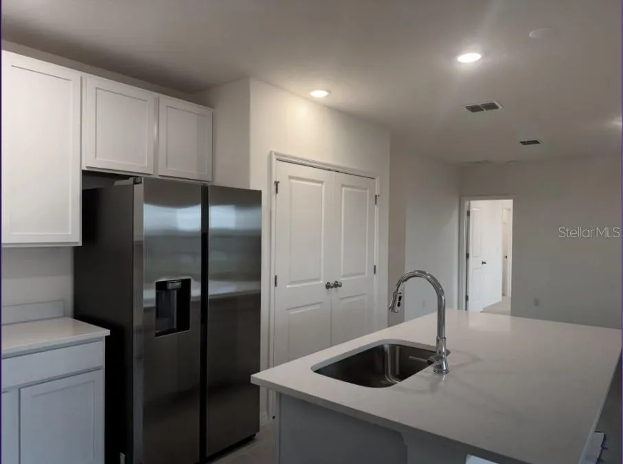 Quartz countertops and stainless steel appliances