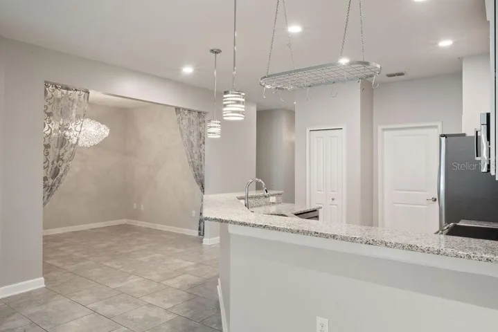 Breakfast Bar with Dining/Flex Room Beyond