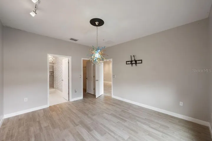 Main Suite toward En-Suite Bath and Walk-In Closet