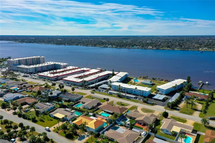 View of the surrounding neighborhood shows the property’s ideal location near shopping, dining, and local conveniences.