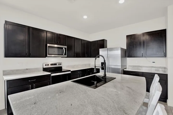 KITCHEN WITH UPGRADED SINK AND DISPOSAL